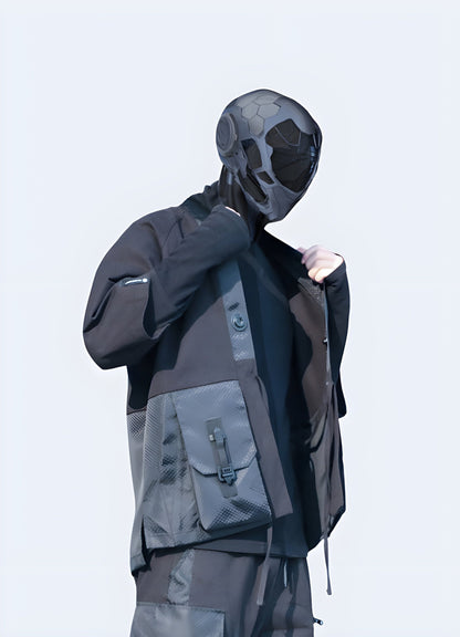 Side view of a man confidently sporting a cutting-edge Silenstrom kimono, showcasing the garment's unique silhouette and edgy, contemporary style.