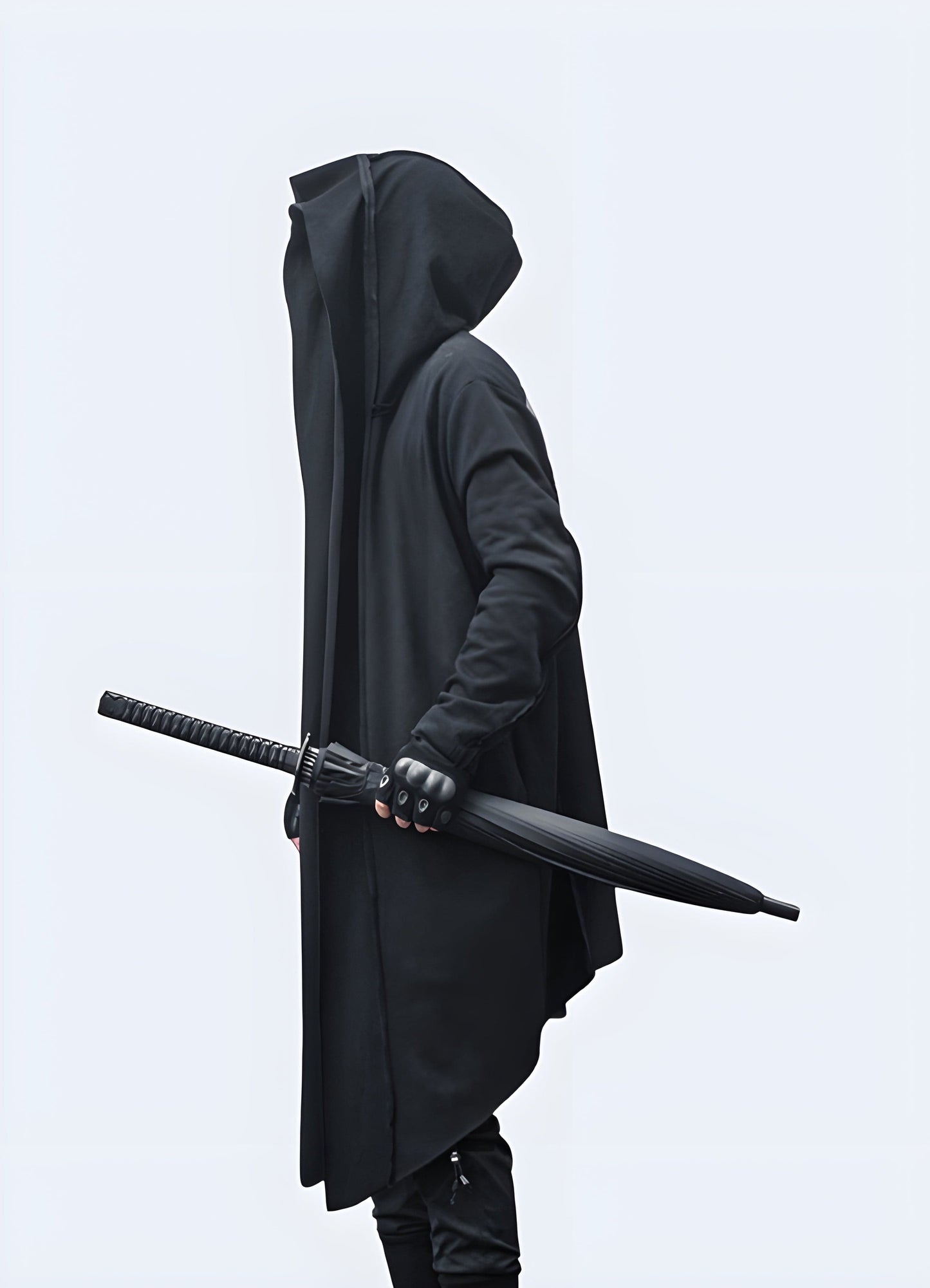 Side view of a man sporting a streetwear cloak, highlighting its edgy aesthetics and versatile design, ideal for elevating any urban outfit in the UK.