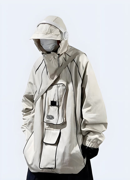 Front view of a man wearing a white tactical poncho hoodie, highlighting the sleek and modern aesthetic, ideal for the UK fashion-conscious adventurer.