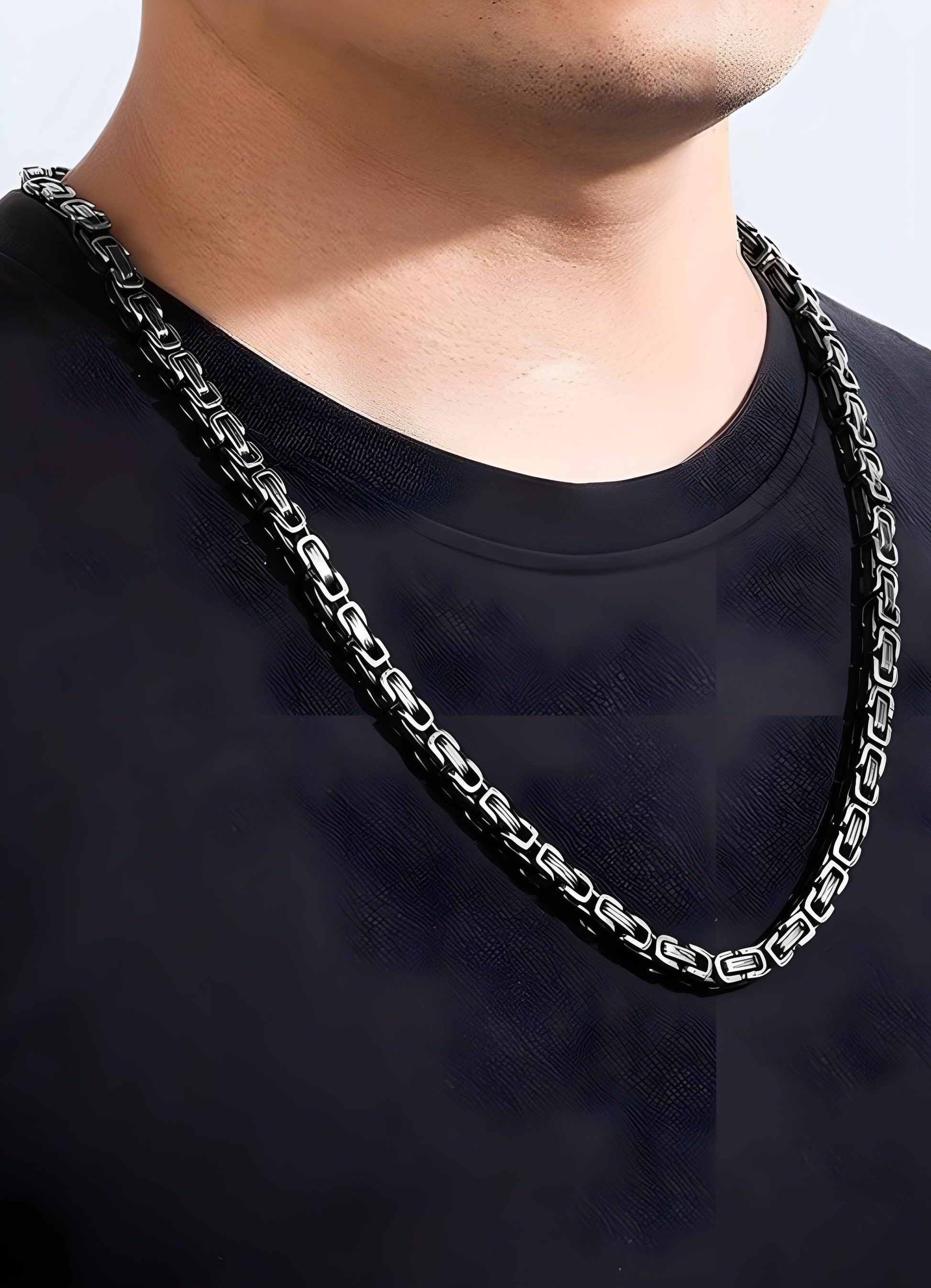 Man wearing a techwear necklace front view on a model, UK, illustrating its modern and fashionable design.