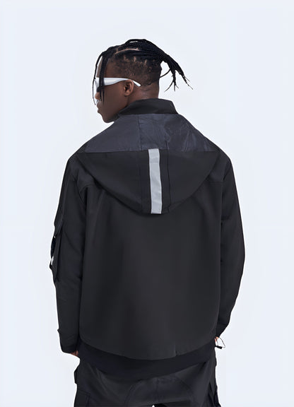 Back and side view of a man wearing a black techwear jacket with an athletic fit, showcasing its streamlined design.