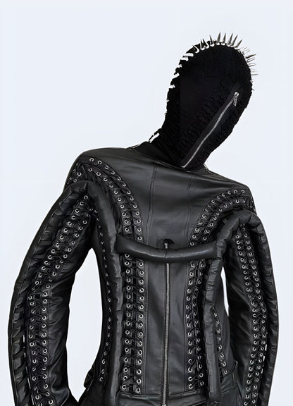 Model showcasing intimidating black spiked full face mask, front view of avant-garde darkwear fashion statement.