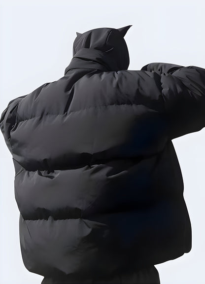 Back view of a man wearing a devil horn jacket, showcasing its distinctive silhouette, high-quality materials, and dark aesthetic, ideal for UK consumers seeking a bold statement piece.