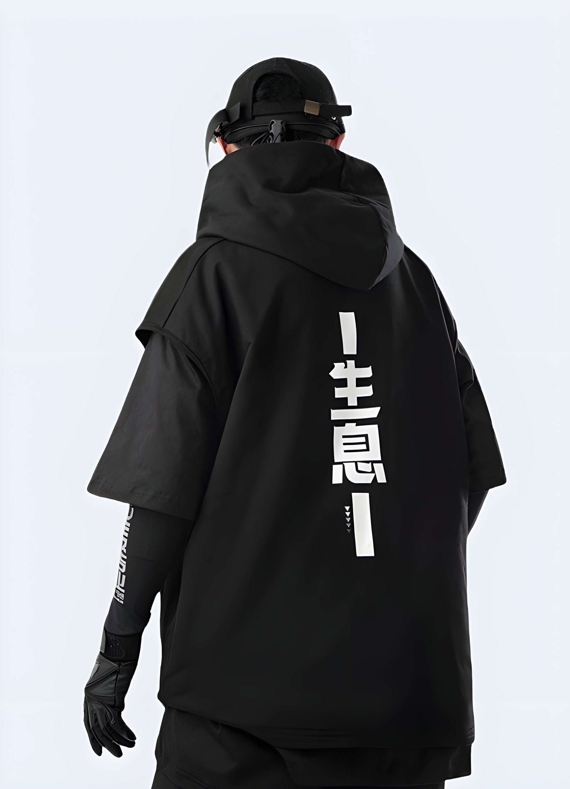 Back view of a man wearing a futuristic hoodie with unique design elements, highlighting the garment's avant-garde style and premium quality, available in the UK.