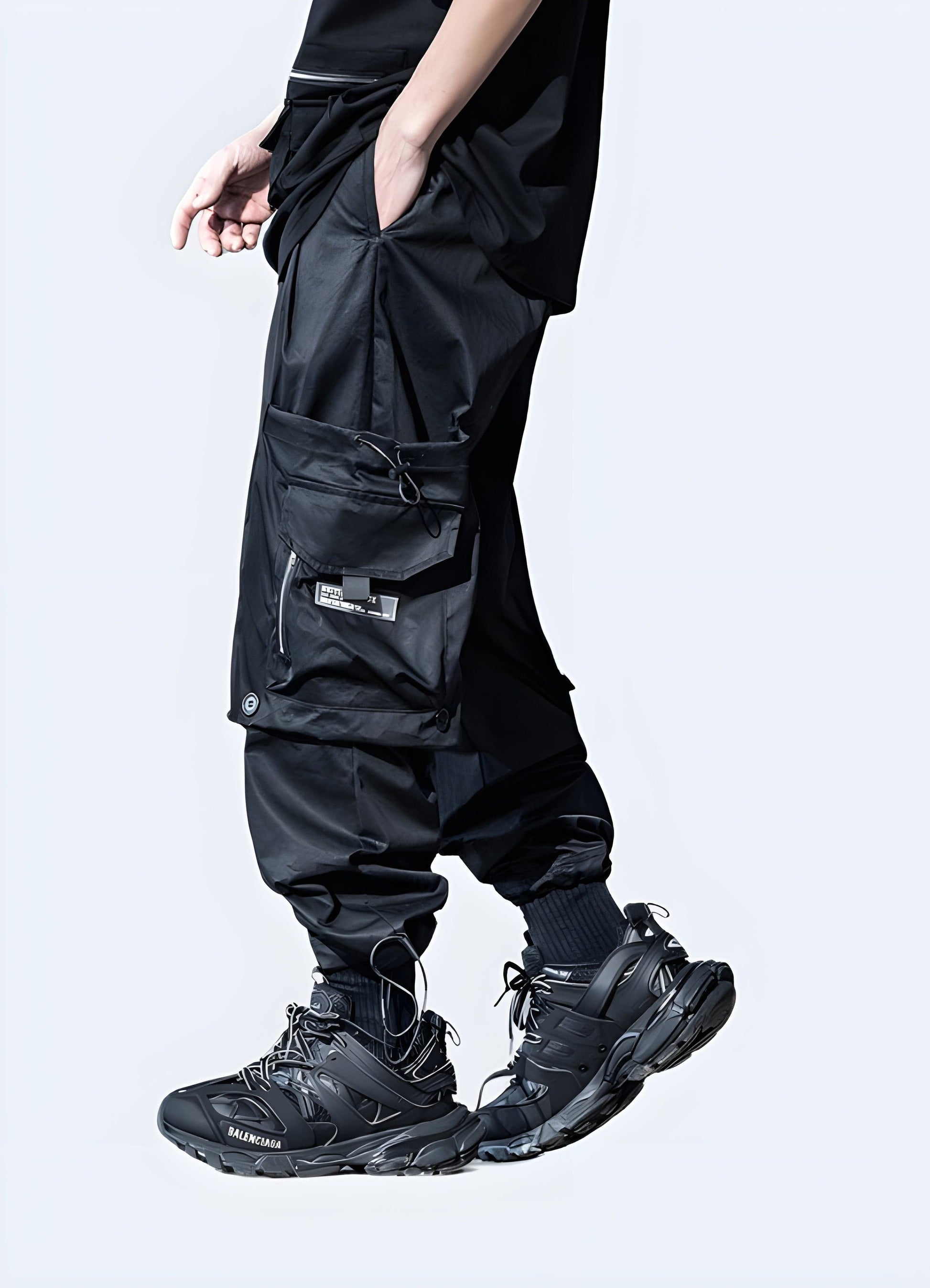 Front side view of men sporting fashionable streetwear cargo pants, highlighting the modern silhouette and utility-inspired details, a must-have for UK streetwear enthusiasts seeking a versatile and on-trend look.