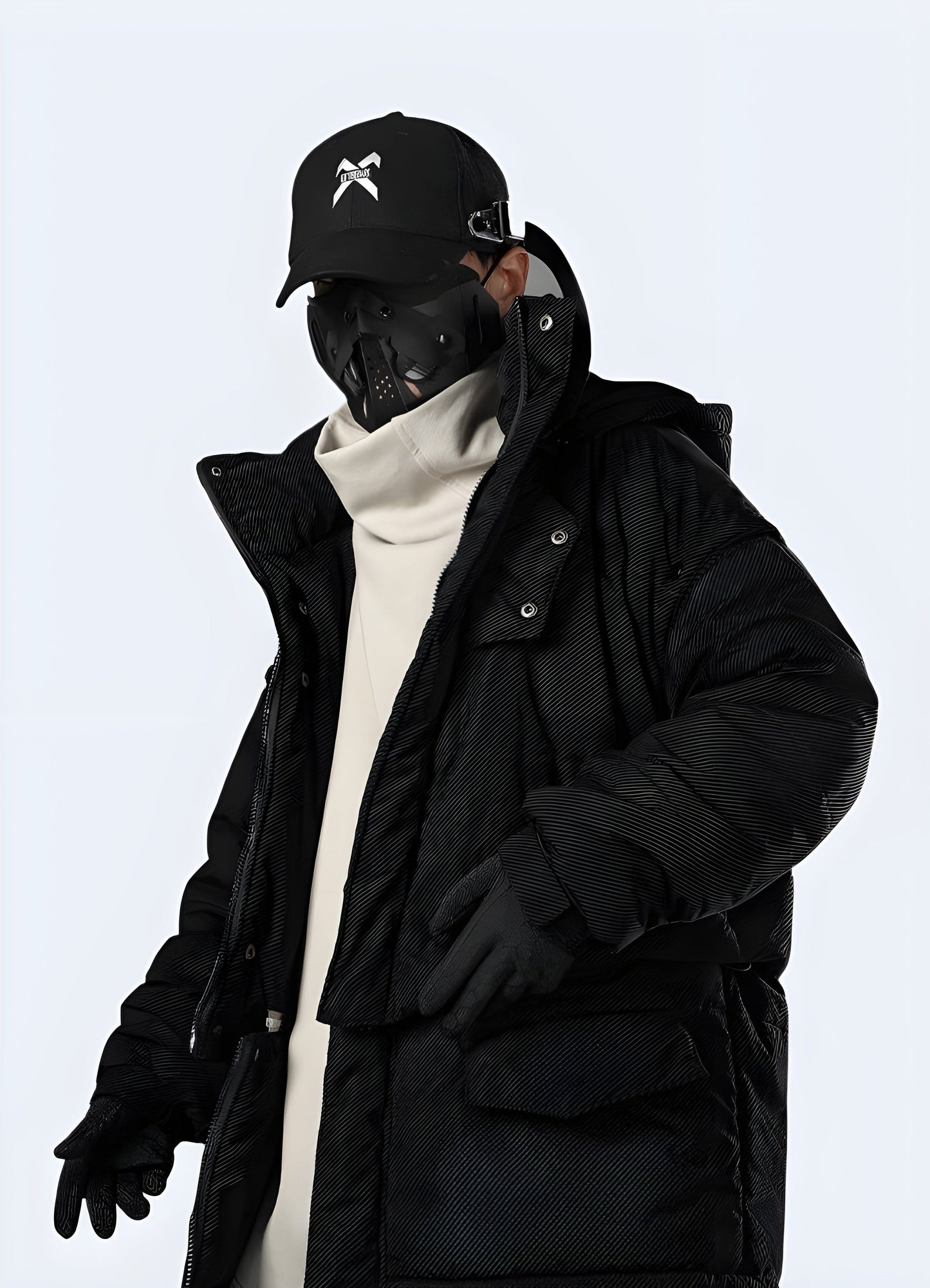 Left side view of a man wearing a technical winter jacket, showcasing its sleek design and advanced insulation features, perfect for UK winter sports enthusiasts and outdoor adventurers.