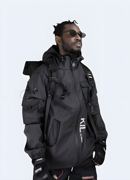 Front and side view of a man wearing a techwear windbreaker, designed for protection against the elements in the UK.