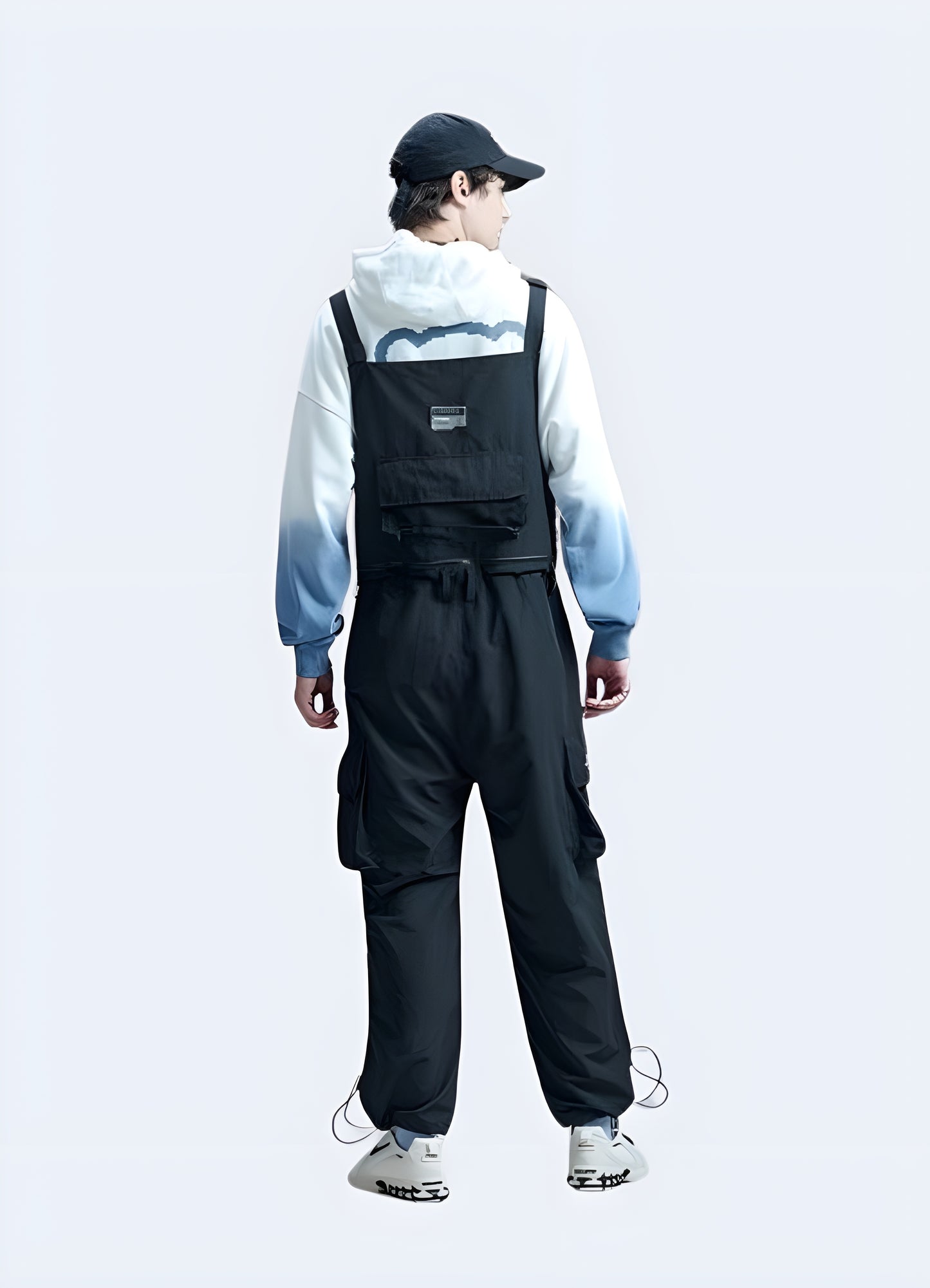 Men's techwear overalls, back view, showcasing modern design and features, available in UK.