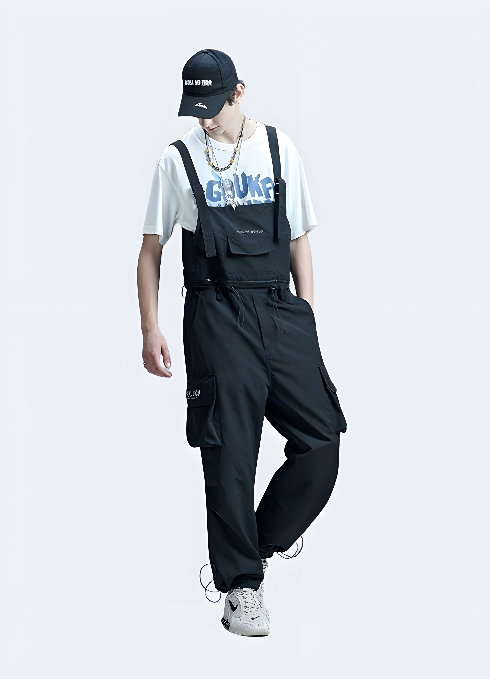 Men's techwear overalls, front view, showcasing modern design and features, available in UK.