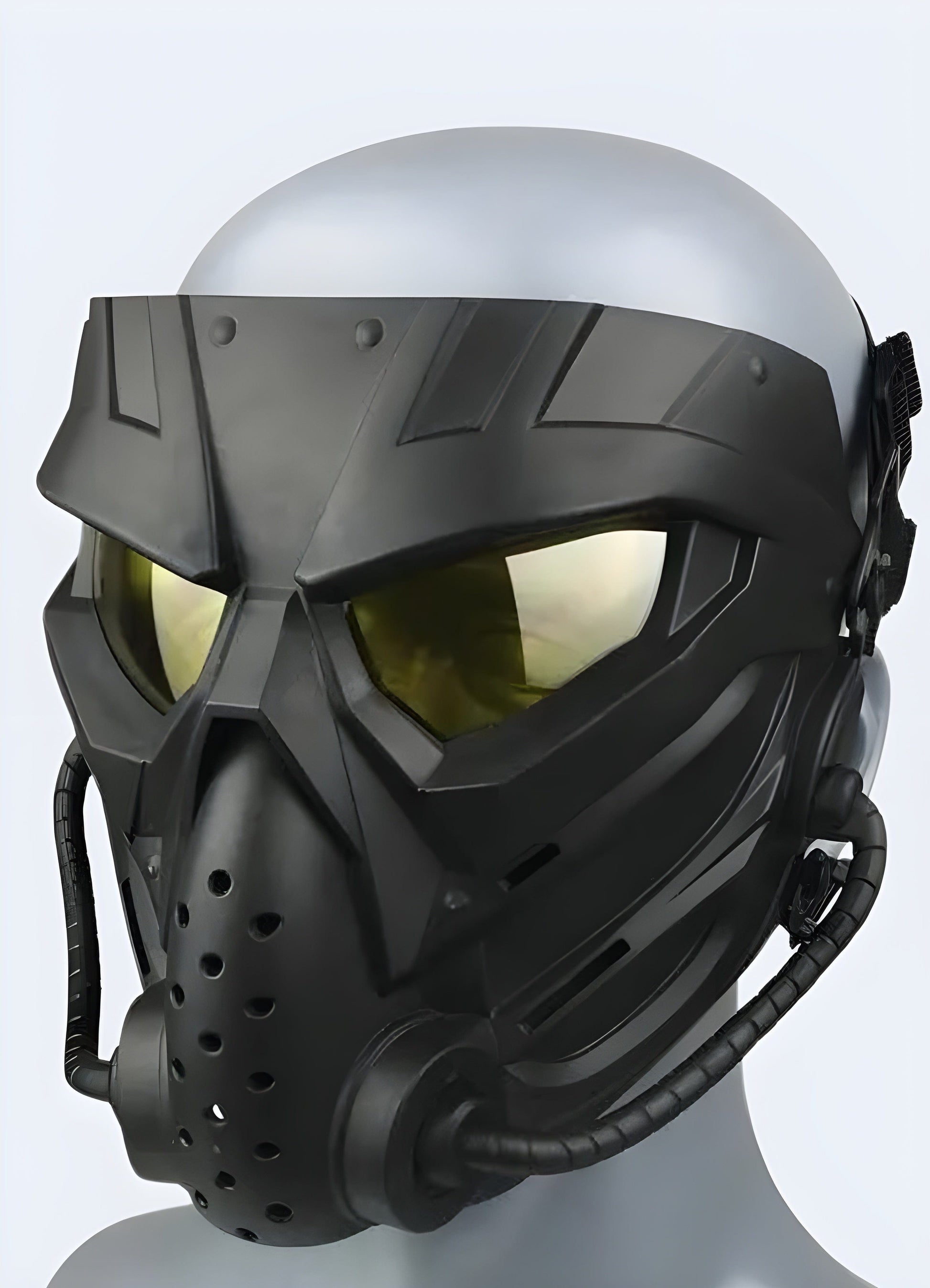 A side view of a model wearing a military tactical mask with gold eye detailing, highlighting its striking design, available in the UK.