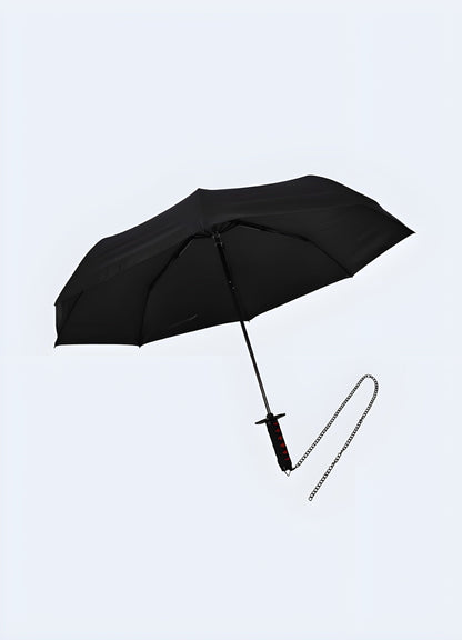 A front view of the mini Japanese katana-style umbrella with the black interior and canopy open. 