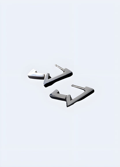 Open view of minimalist techwear silver earrings from the UK, showcasing their sleek geometric design and modern aesthetic.