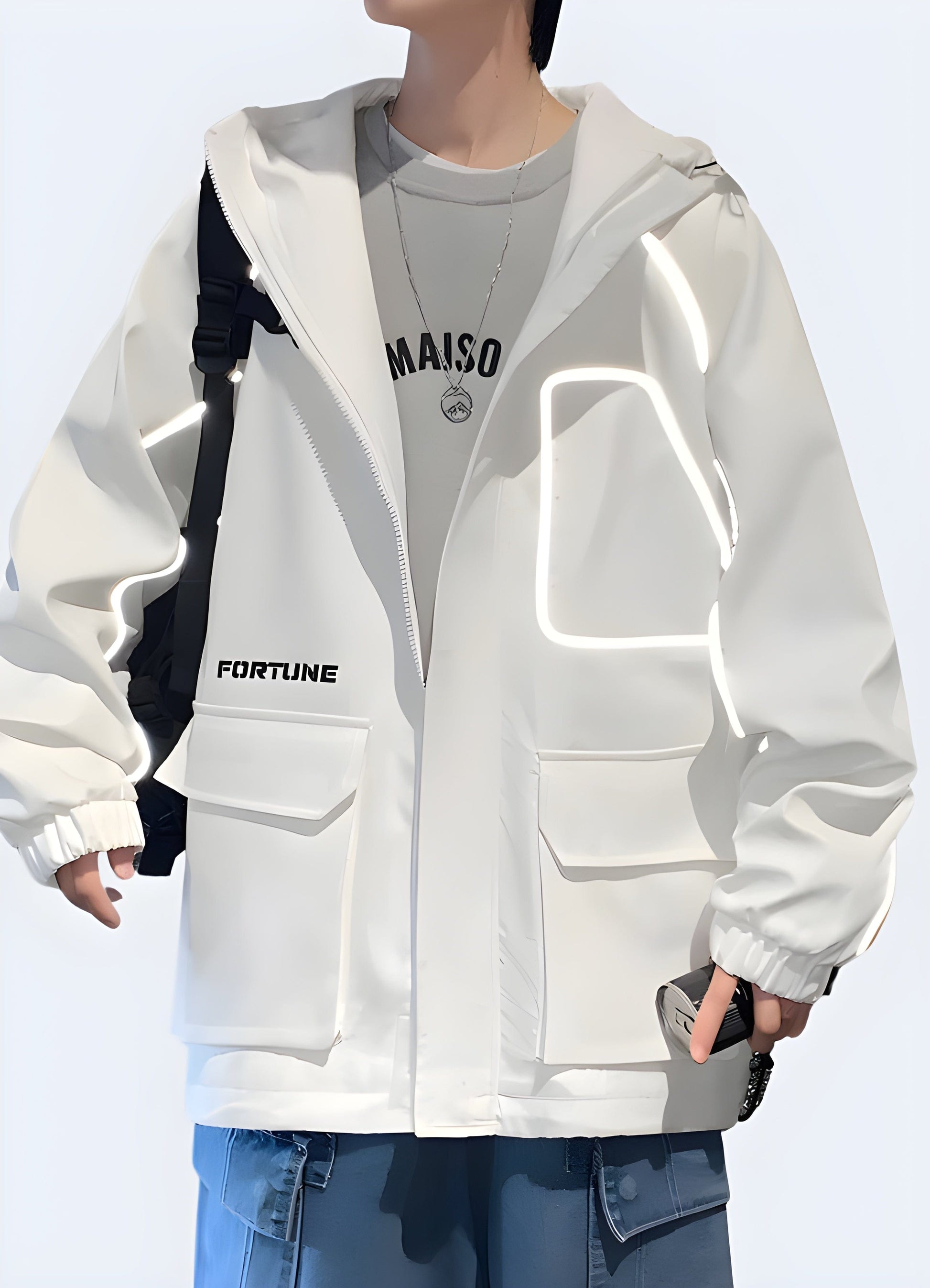 Front view of a model wearing a reflective rain jacket, showcasing its eye-catching reflective elements and modern design, ideal for style-conscious UK consumers prioritizing safety and visibility.