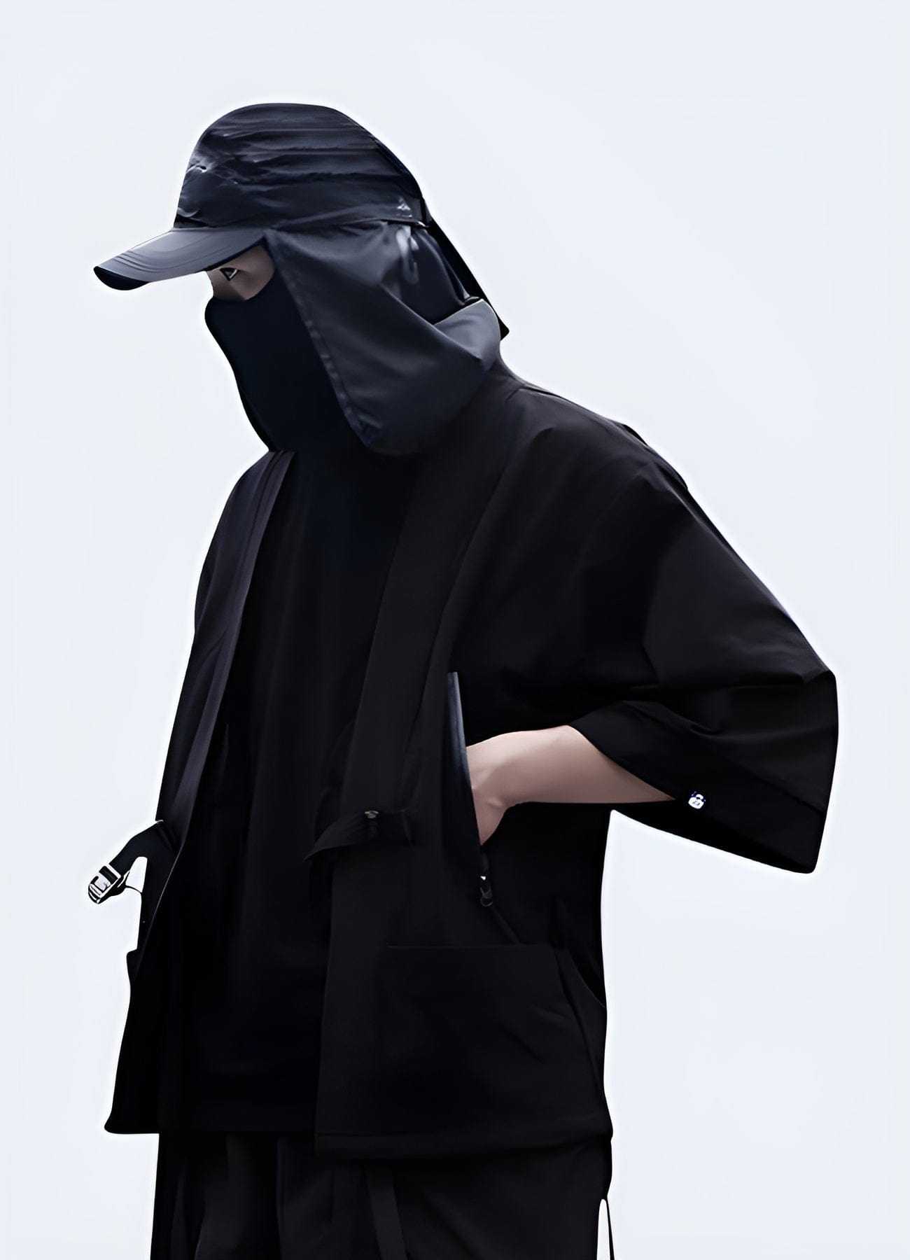 Mysterious ninja kimono for men, inspired by traditional Japanese stealth warriors, perfect for making a bold statement in the UK alternative fashion scene.