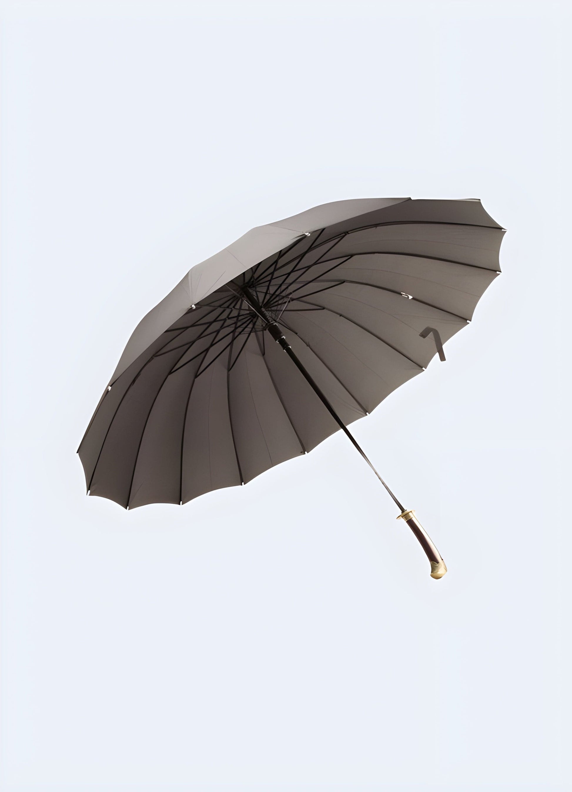 Front view of a ninja sword umbrella with 16 ribs, demonstrating its reinforced build for enhanced durability, available in the UK.