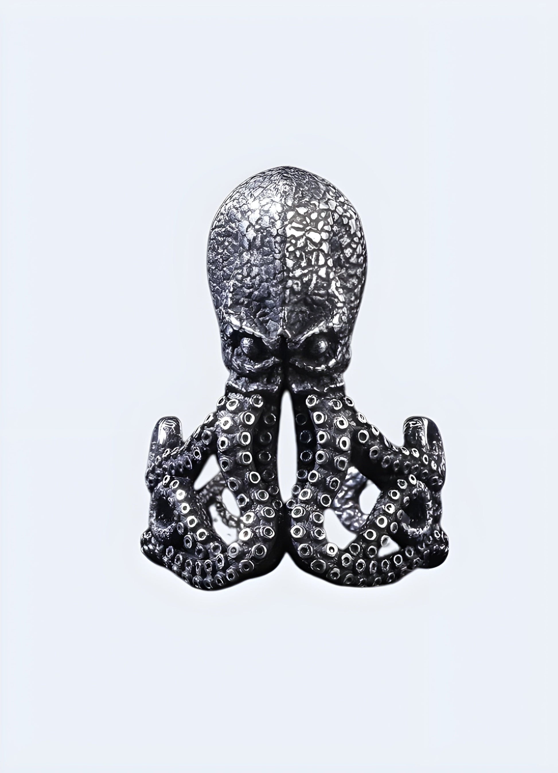 Octopus ring with intricate tentacle design, UK, showcasing detailed craftsmanship.