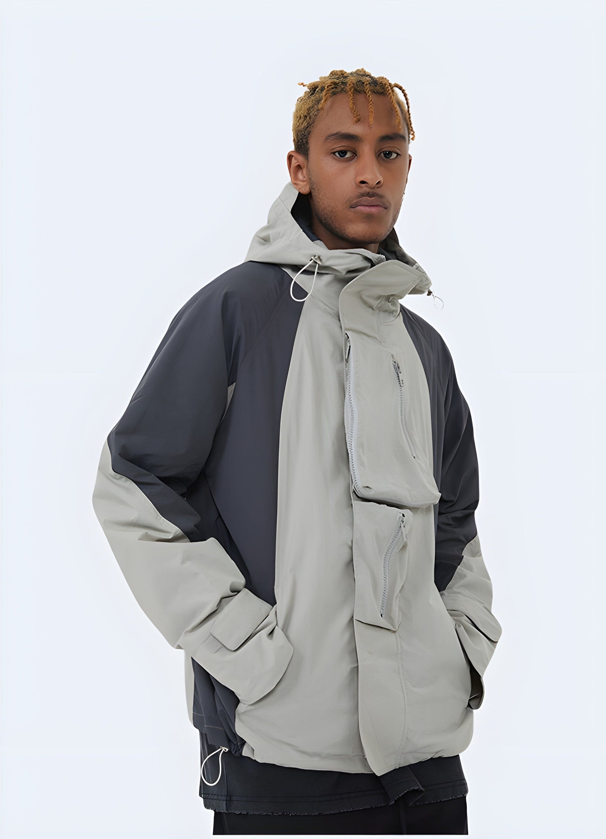 Model wearing an oversized-fit streetwear windbreaker, highlighting its relaxed silhouette and eye-catching design, ideal for fashion-forward individuals in the UK's urban scene.