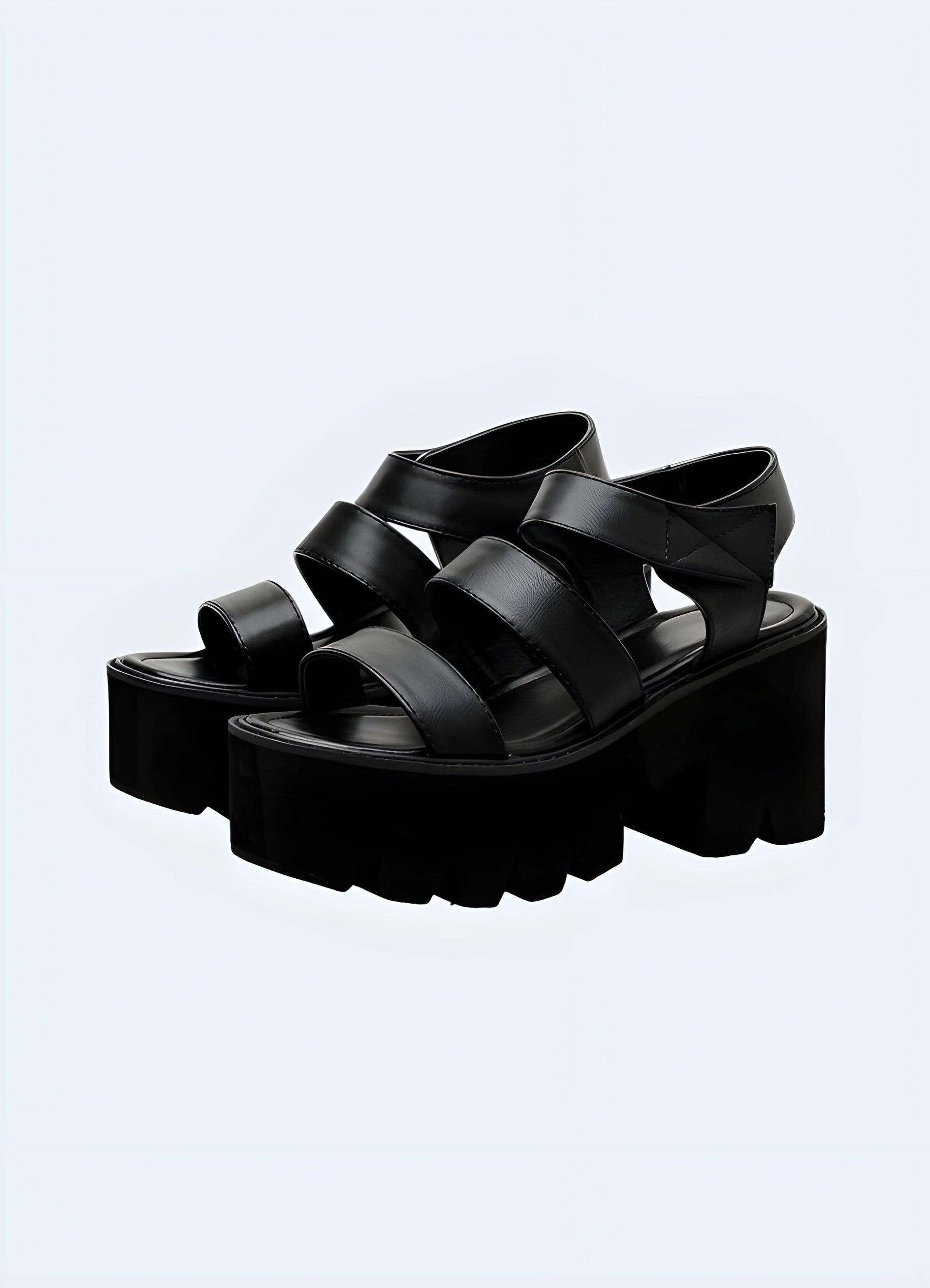 Front and side view of platform sandals with a chunky heel, highlighting the fashionable aesthetics, secure ankle strap, and versatile style suitable for various occasions.