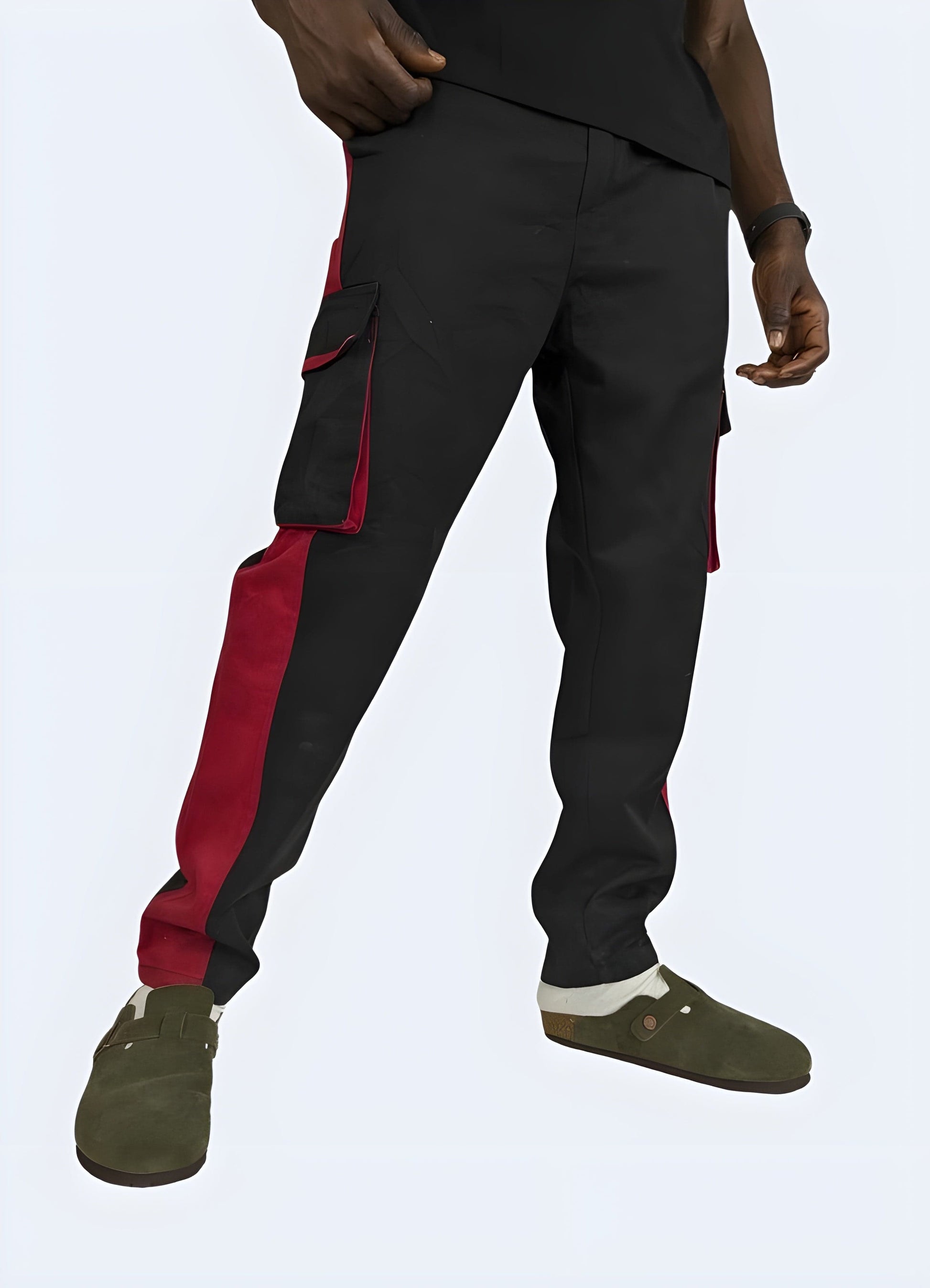 Red techwear pants, front view, modern streetwear design, available in UK sizes.