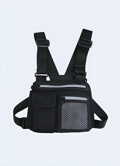 Reflective black chest rig, front view, UK. Stylish and functional for urban environments.