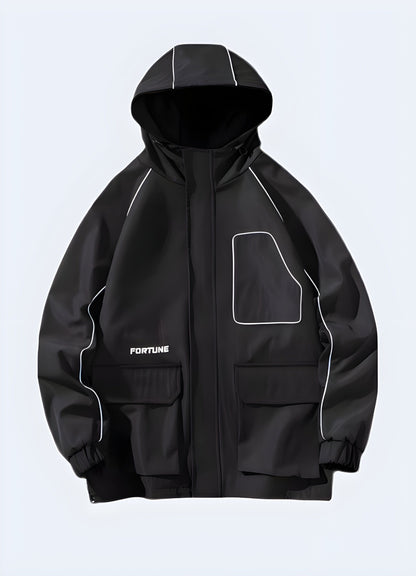 Front side view of a black weatherproof reflective rain jacket, showcasing its durable materials, seam-sealed construction, and reflective elements, ideal for UK outdoor enthusiasts seeking a reliable and high-visibility outerwear option.