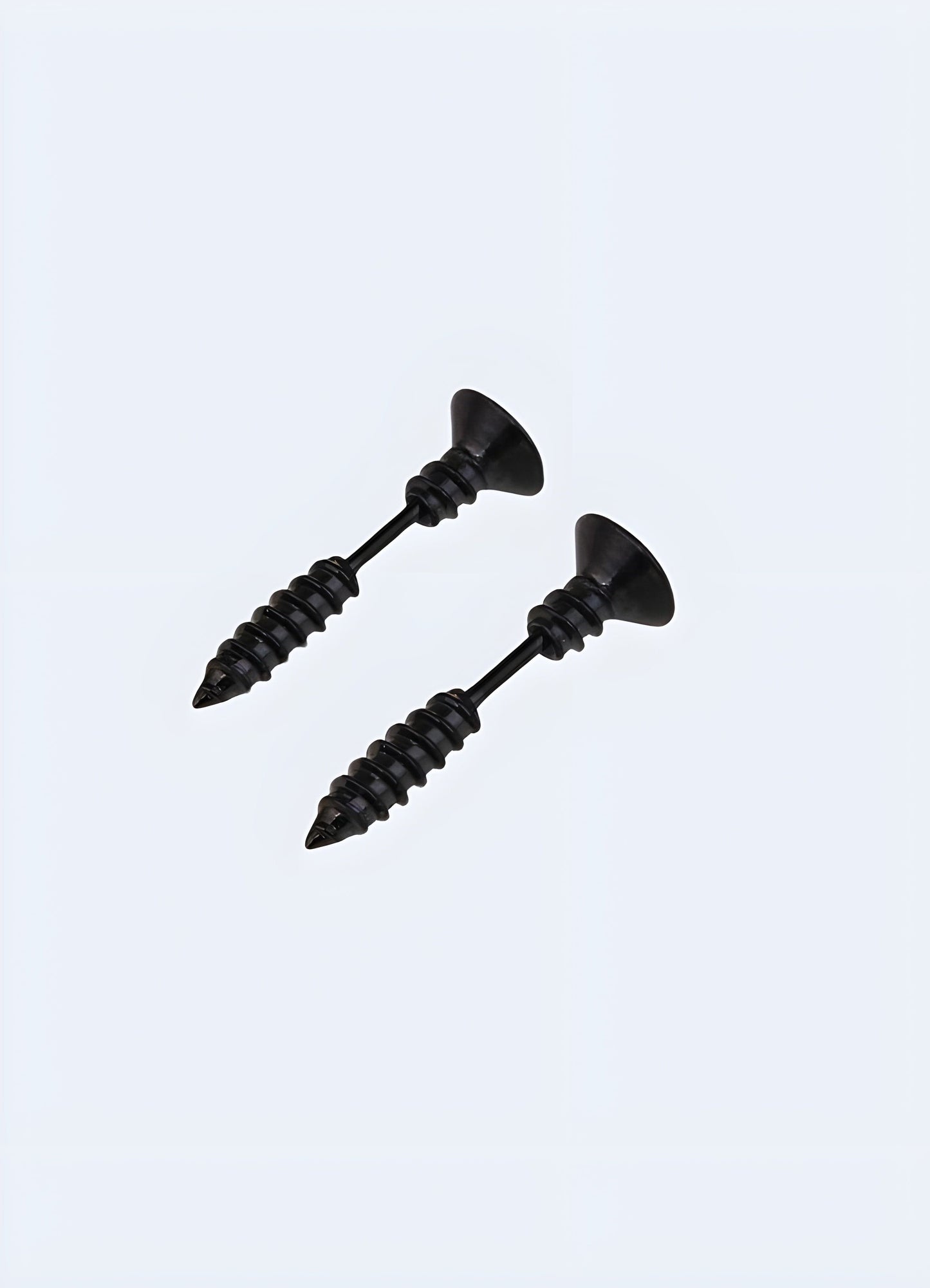 Side view of a screw-shaped techwear earring from the UK, highlighting its sleek and modern design.