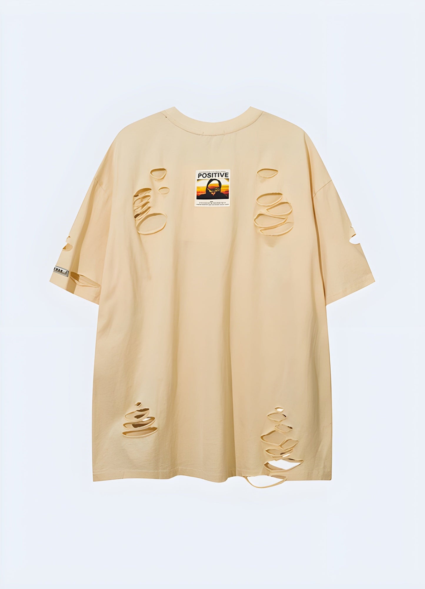 Back view of a beige shirt adorned with trendy chain details, highlighting its versatile and edgy design for those who appreciate unconventional style in the UK.