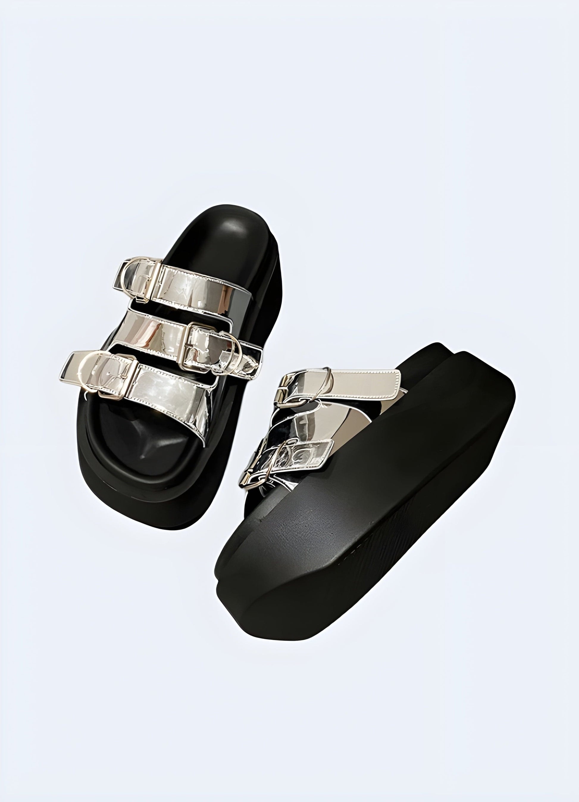 Front view of silver chunky sandals, showcasing the eye-catching metallic color, sturdy platform sole, and trendy silhouette for a statement-making look.