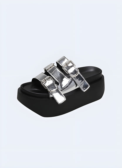 Silver chunky sandals featuring a metallic finish and bold design, perfect for adding a touch of glamour and edge to any summer outfit.