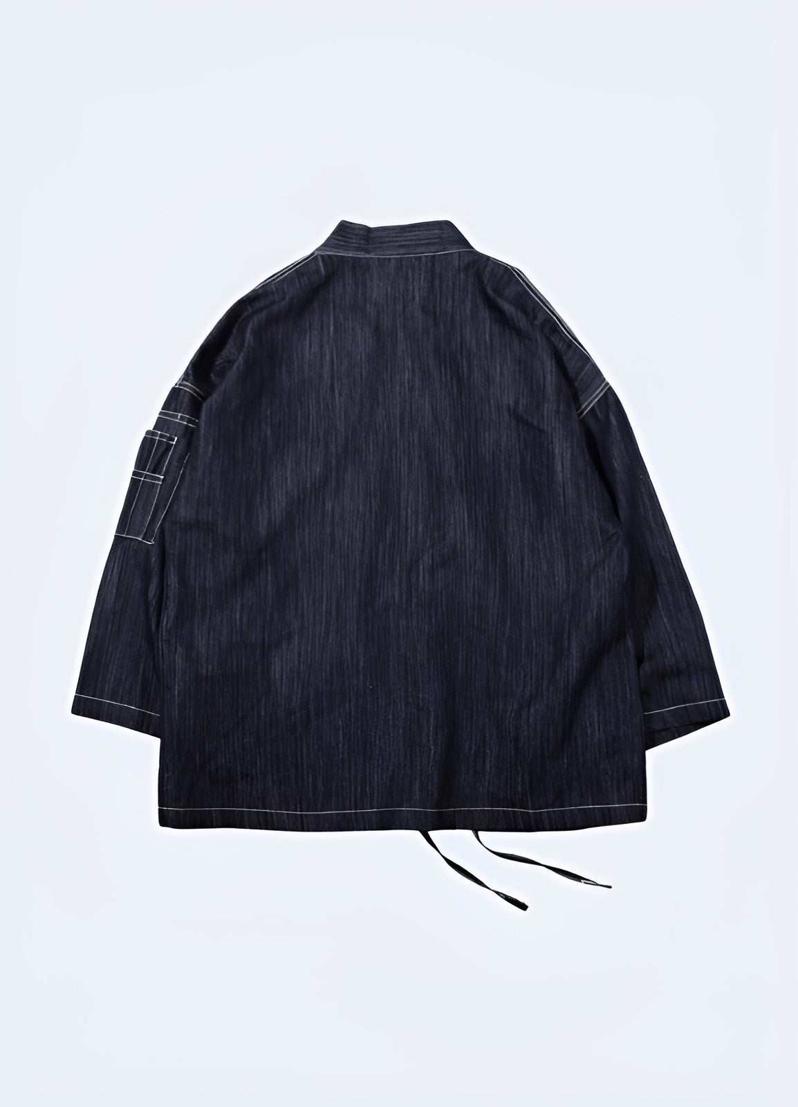 Sleek silhouette of a Japanese blazer, back view, emphasizing its sophisticated design and superior tailoring, a must-have for UK fashion enthusiasts.