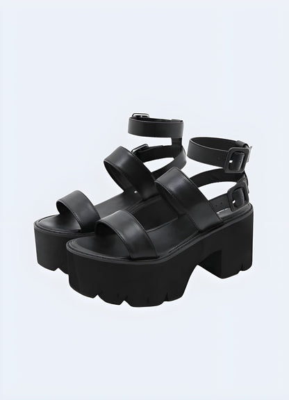 Front and side view of strappy chunky heeled sandals, showcasing the eye-catching strappy silhouette, sturdy construction, and trendy appeal ideal for fashion-forward individuals.