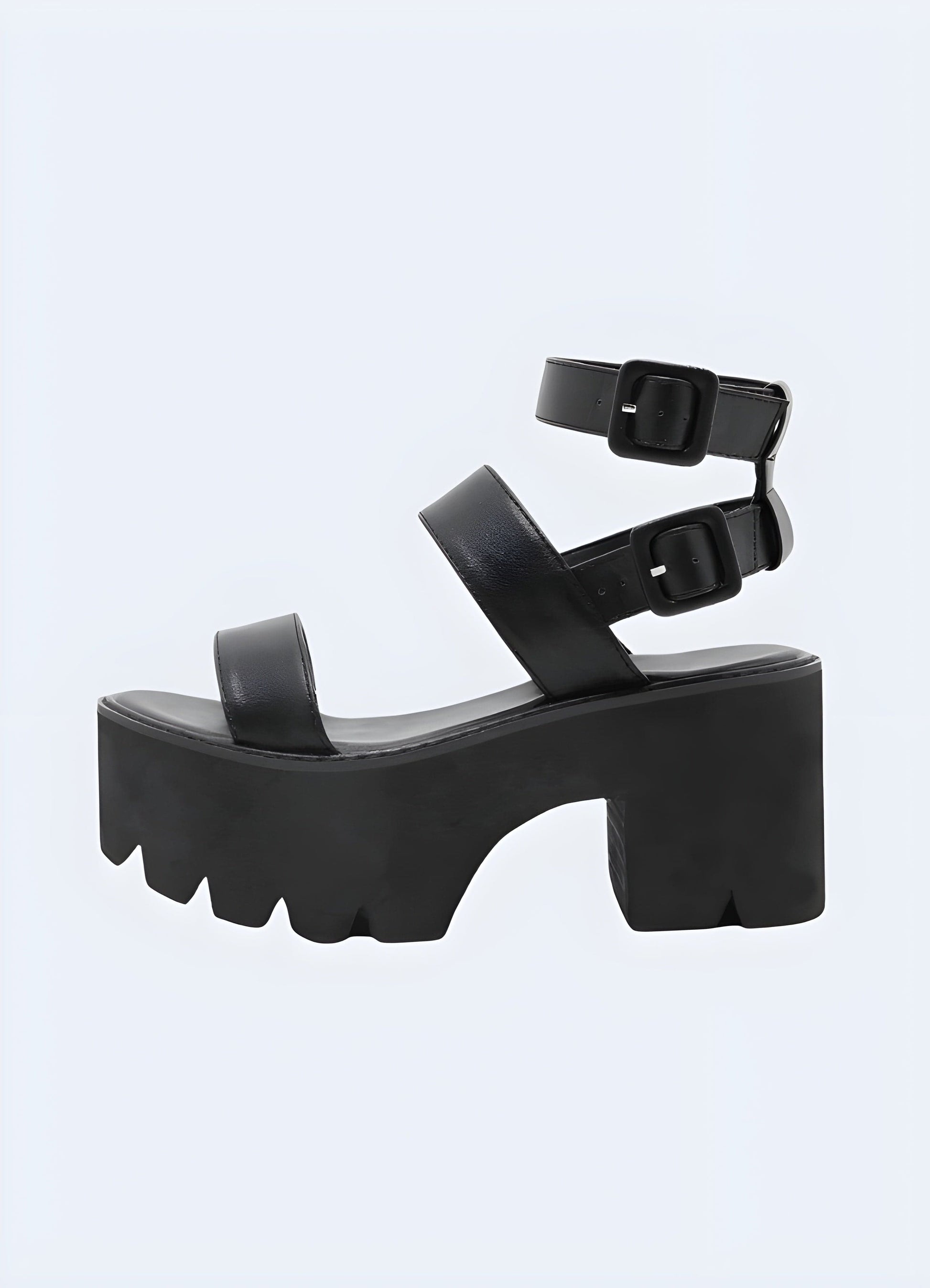 Side view of strappy chunky heeled sandals, highlighting the robust block heel, secure ankle straps, and chic design for a confident and fashionable look.