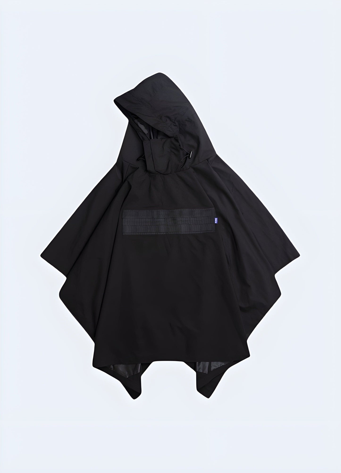 Model showcasing the front view of a tactical cloak, highlighting its sleek design and adaptable style, perfect for outdoor enthusiasts and urban explorers in the UK.