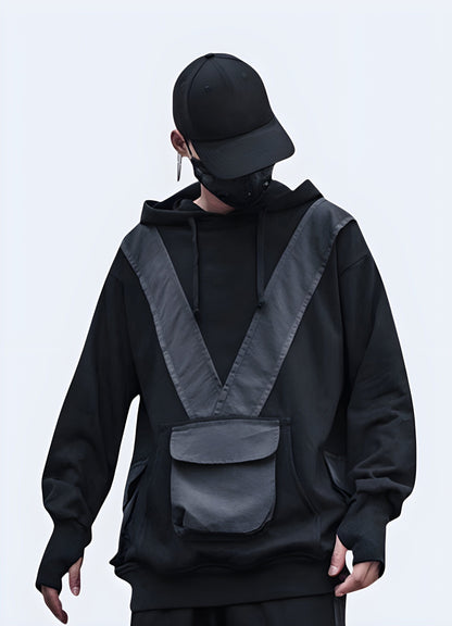 Man wearing a black tactical sweatshirt, front view, showcasing its rugged design and functionality for UK customers.