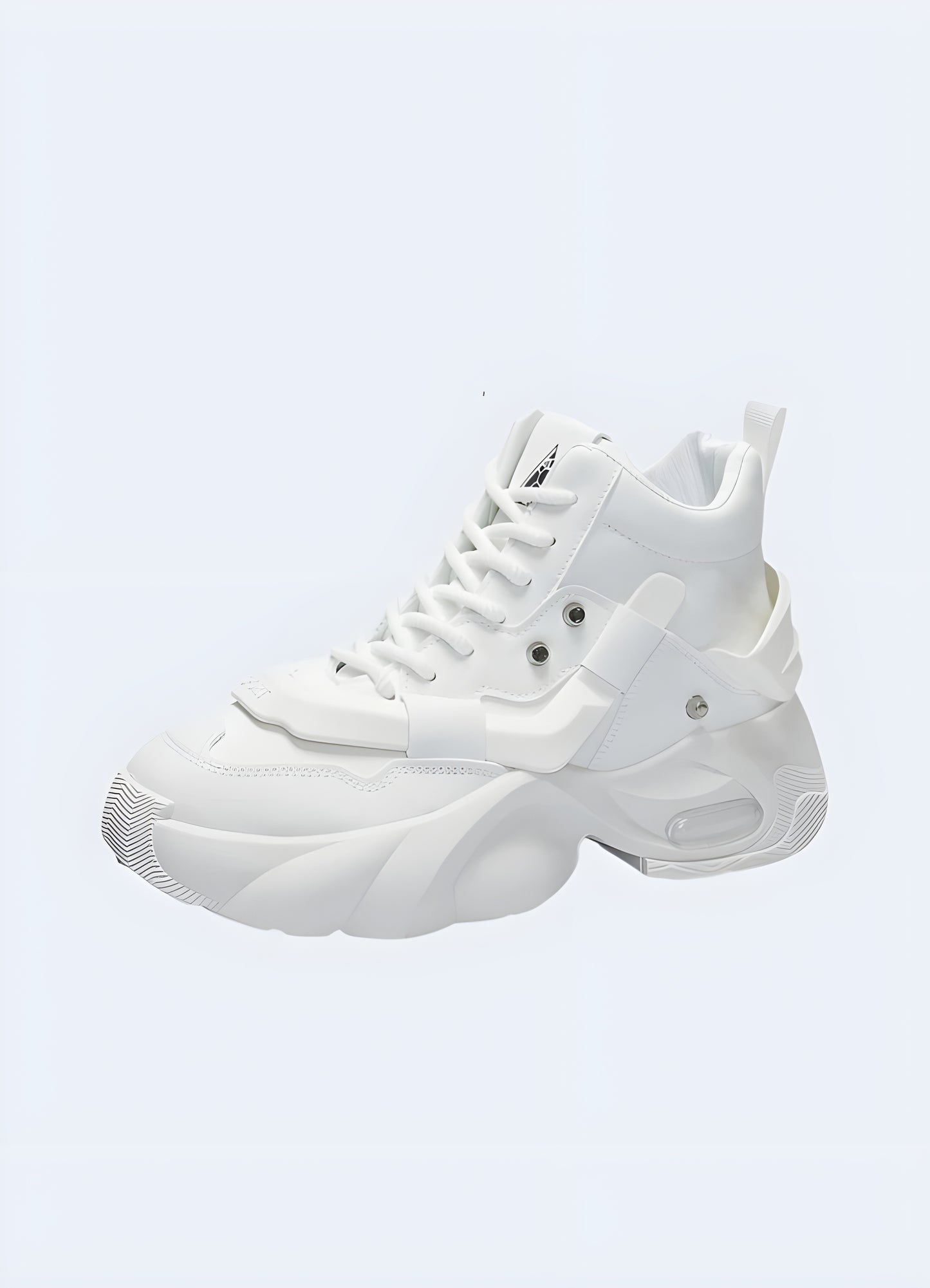 Side view of white technical sneakers with unique sole and upper design, showcasing cutting-edge style in the UK.