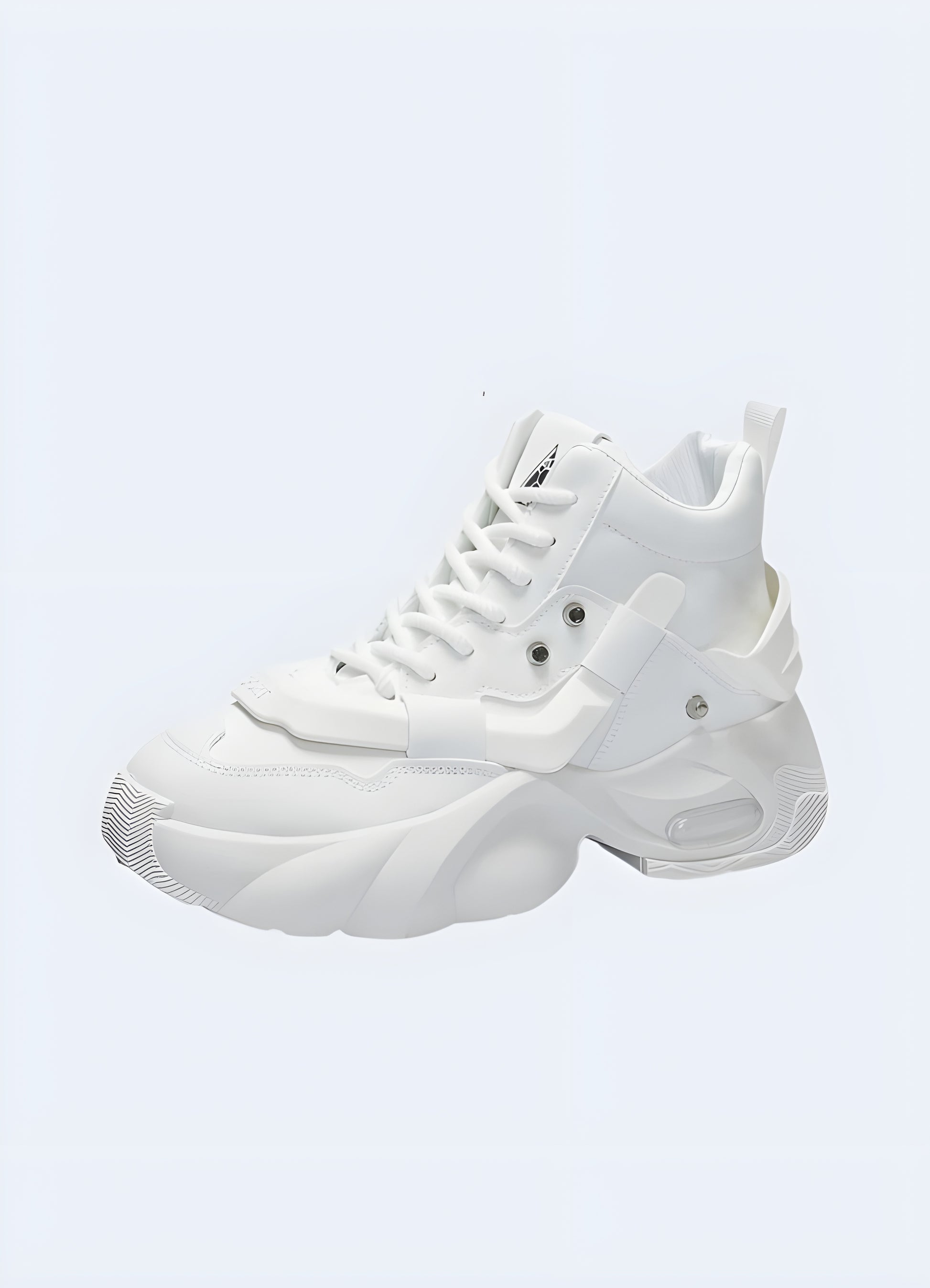 Side view of white technical sneakers with unique sole and upper design, showcasing cutting-edge style in the UK.