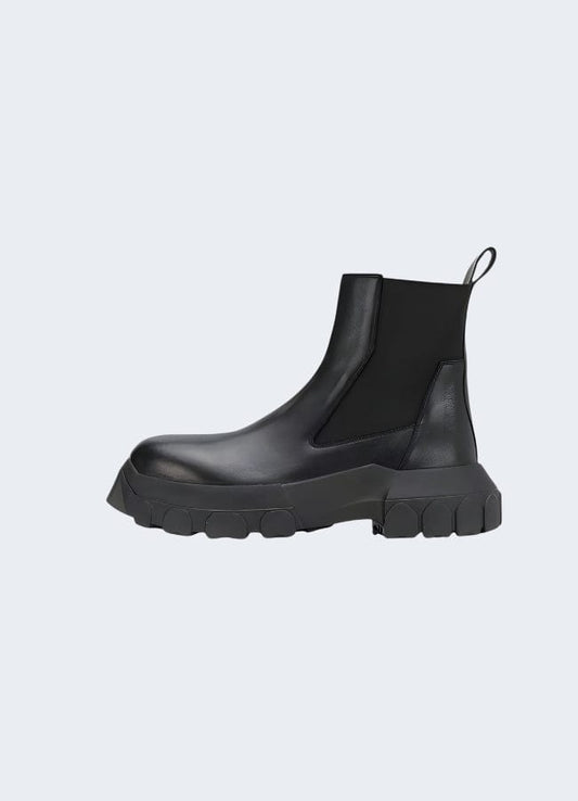 Sleek techwear Chelsea boots, combining modern technology and classic style for urban exploration and everyday wear in the UK.