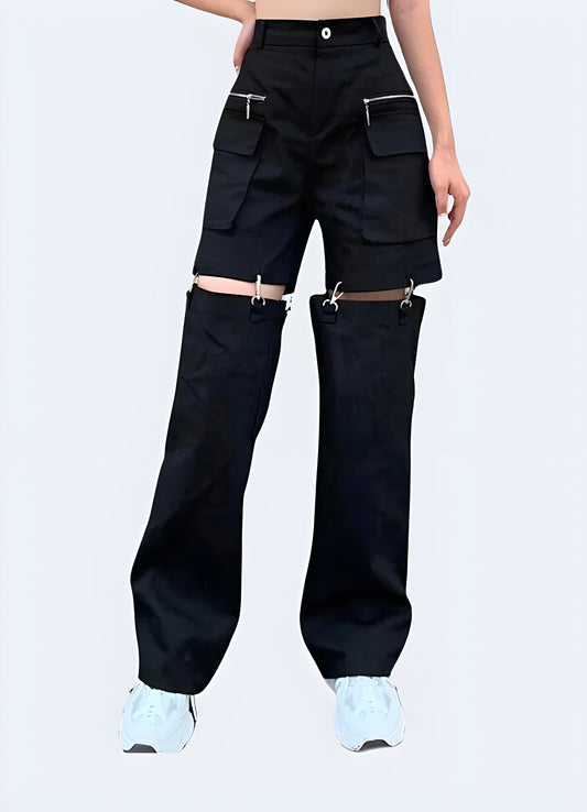 Women's techwear convertible cargo pants in black, featuring detachable legs for versatile wear during urban exploration and outdoor activities.