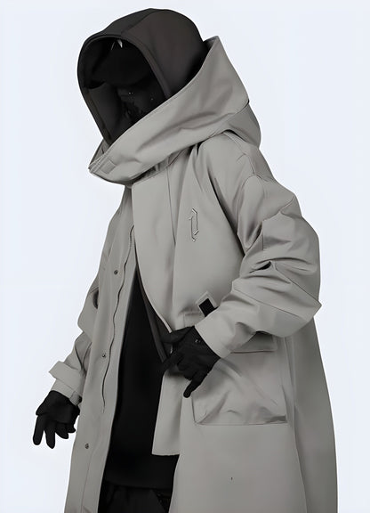 Side view of a man wearing a ninja-inspired techwear windbreaker with straps, ideal for urban style in the UK.