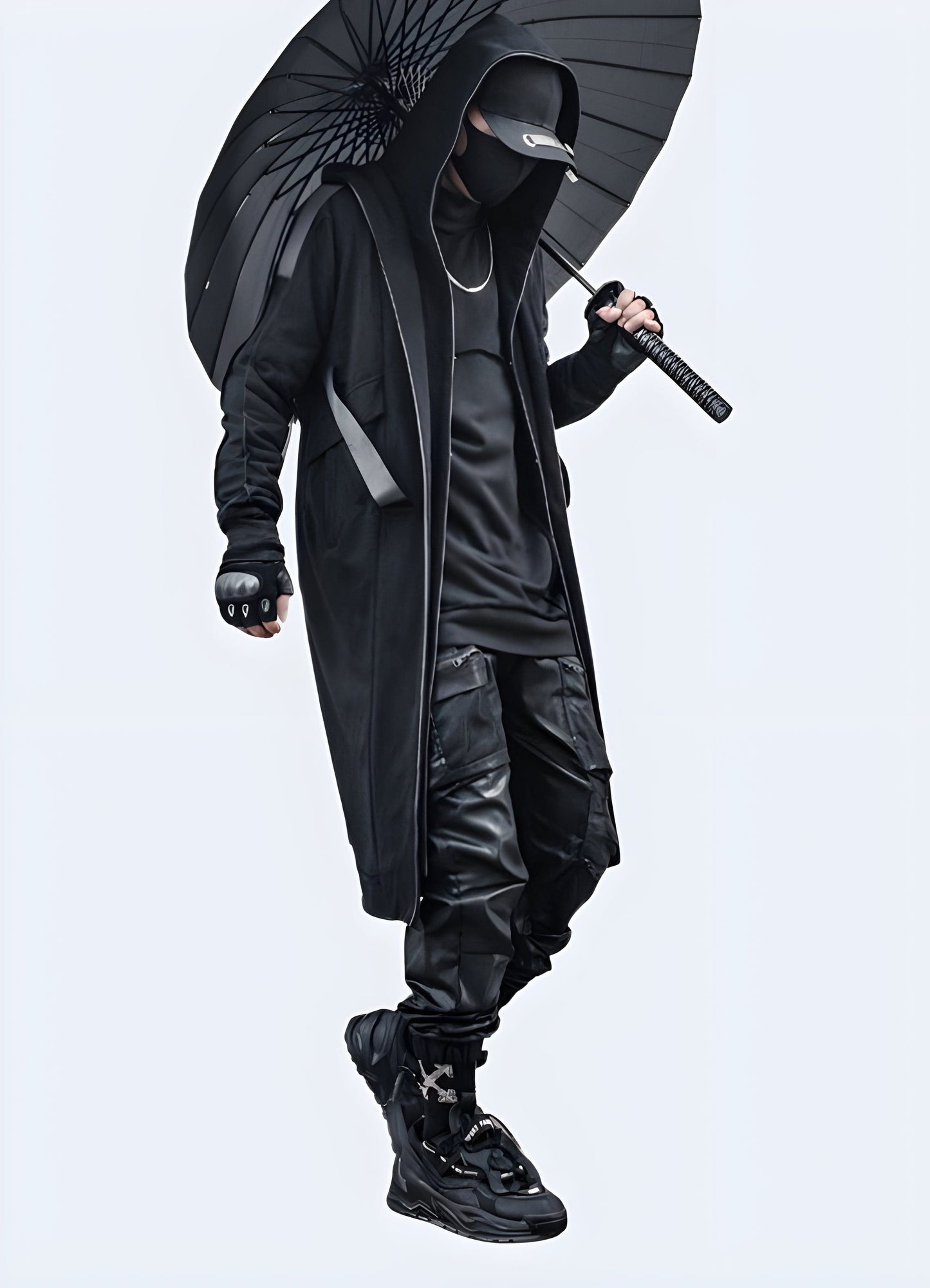 Side view of a sophisticated techwear overcoat, combining elegance and technical performance for fashion-forward individuals in the UK.