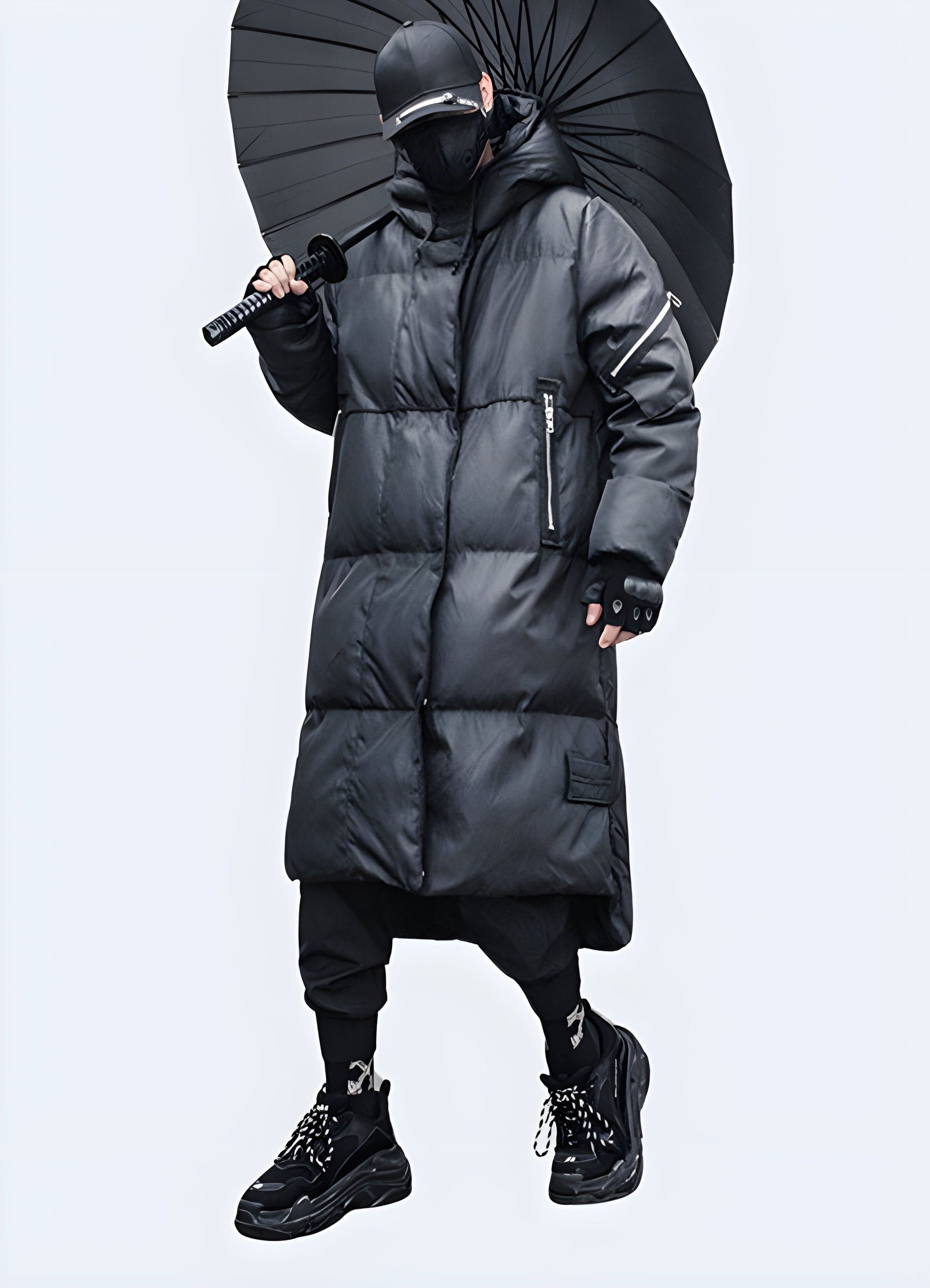 Stylish men's techwear parka jacket in black, side view showcasing regular fit suitable for layering, available for purchase in the UK.