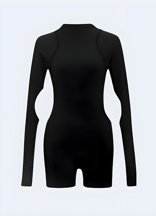 Innovative black techwear playsuit with unique design features, perfect for UK fashion enthusiasts seeking cutting-edge urban wear.