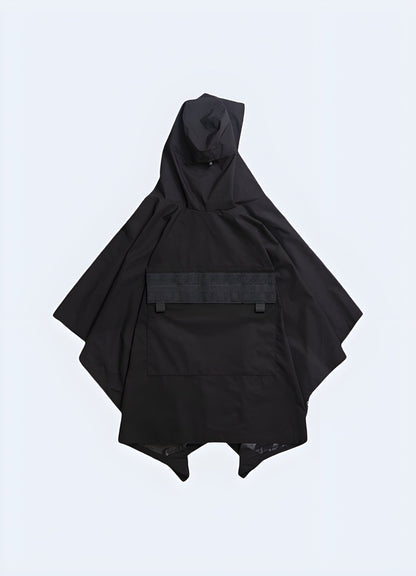 Back view of a techwear poncho, highlighting the waterproof and breathable materials, ideal for staying protected and stylish in the UK weather.