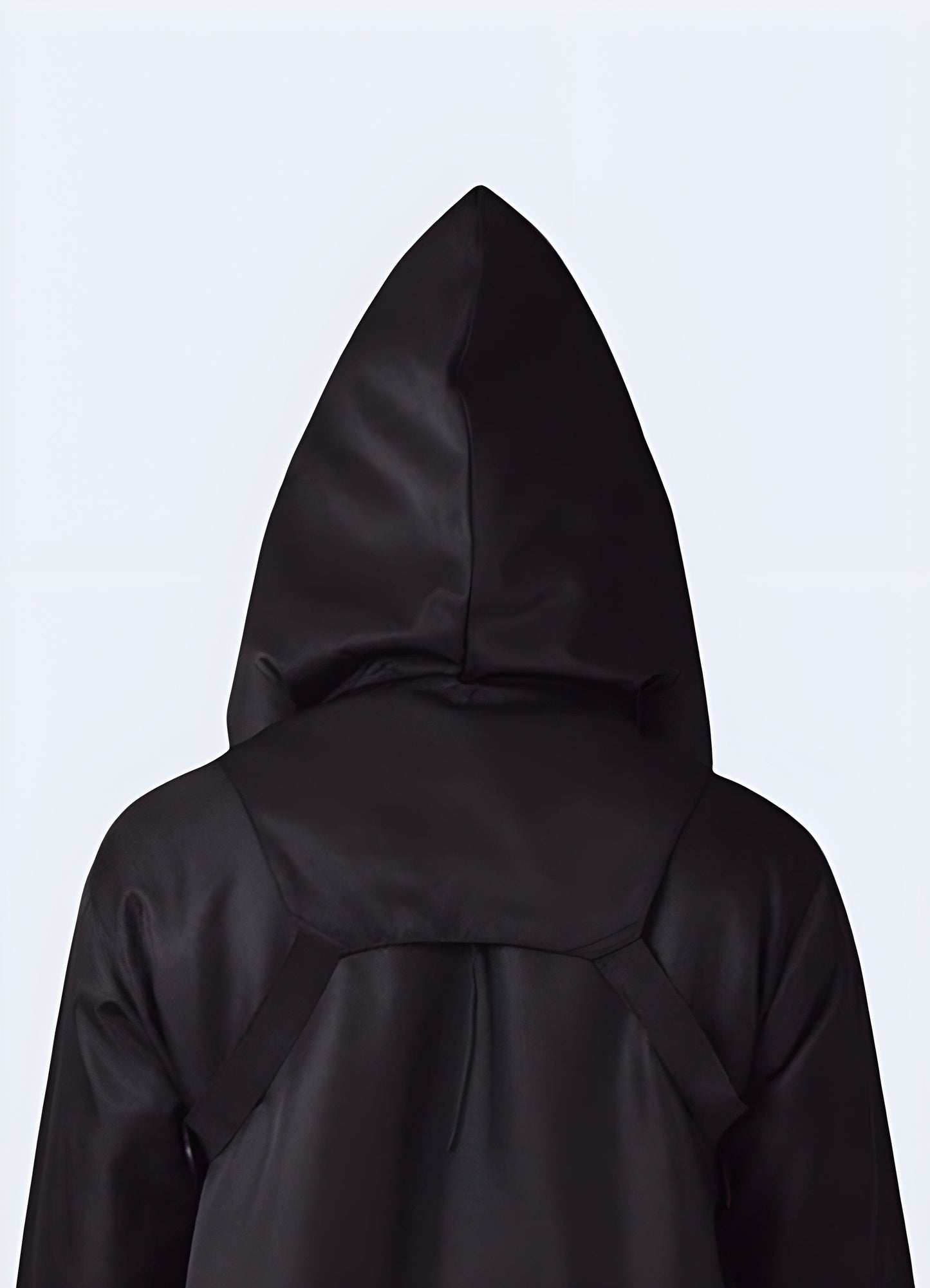 A black techwear scarf with a hood shown in a back view, highlighting its sleek design and versatility in the UK.