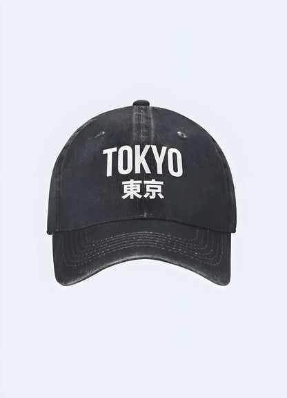 Black Tokyo Japan trucker cap with a white logo, front view. Stylish and trendy headwear for casual outfits.