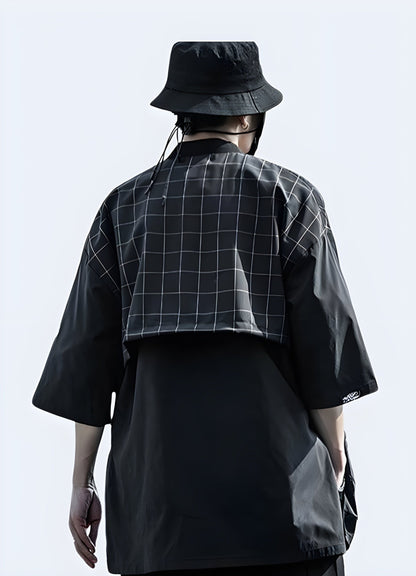 Back view of a figure wearing a classic traditional black Japanese kimono, emphasizing the intricate details, fine stitching, and the graceful drape of the silk fabric that embodies centuries of Japanese tradition.