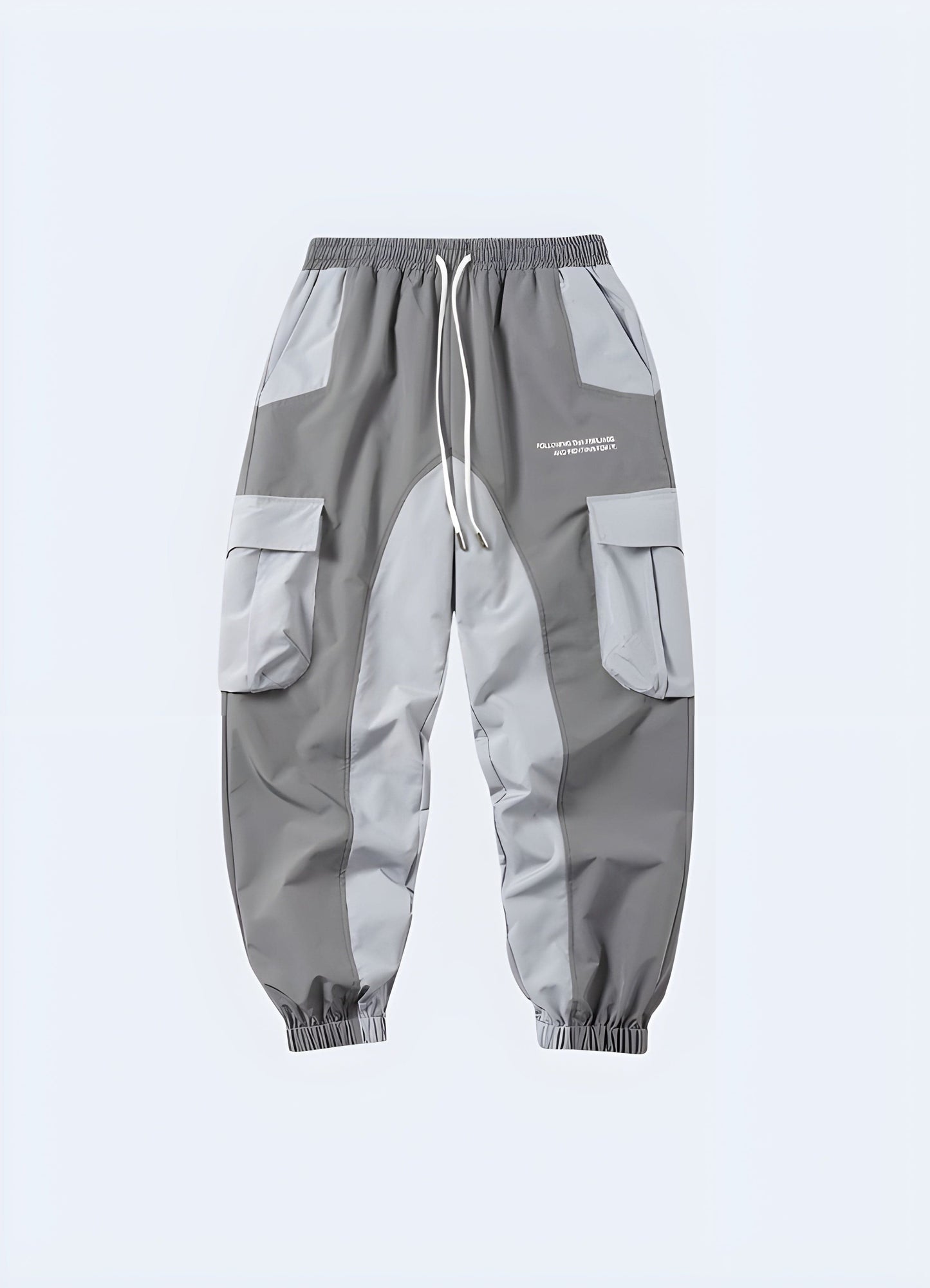 Grey cyberpunk joggers, front view, edgy and comfortable bottoms for UK tech-savvy fashionistas.