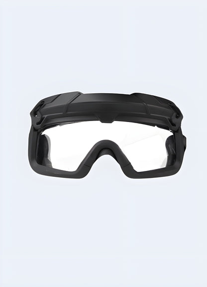 Smoke lenses, rubber grips, and an angular frame project a bold, tactical aesthetic UK.