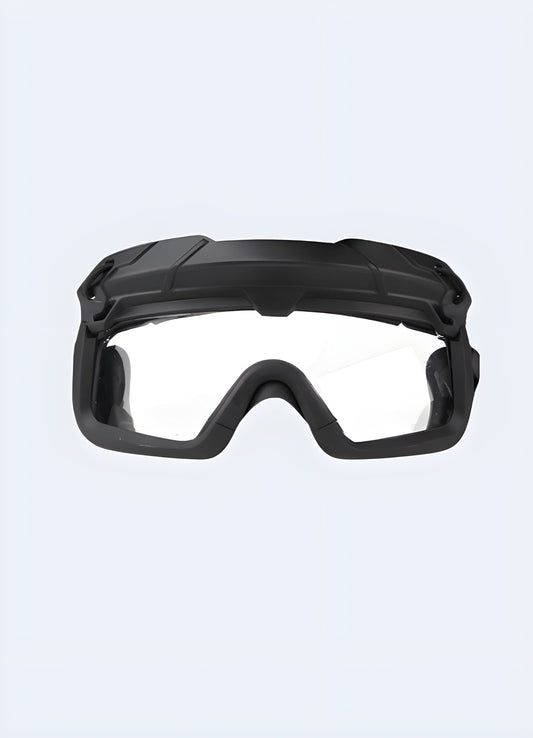 Smoke lenses, rubber grips, and an angular frame project a bold, tactical aesthetic UK.