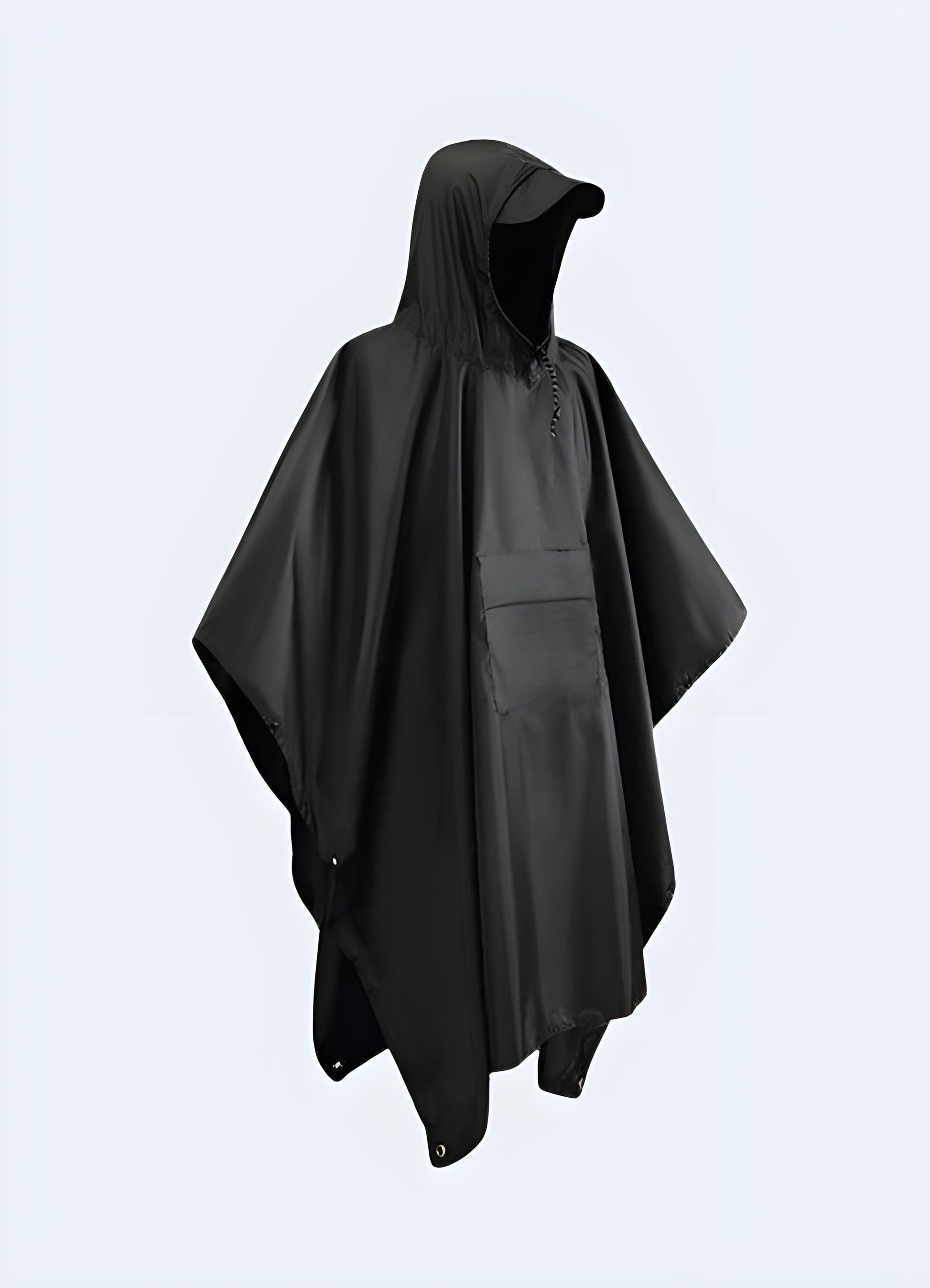 High-performance waterproof techwear poncho, engineered with advanced materials and seam-sealed construction, providing superior protection against the elements without compromising on style or comfort.